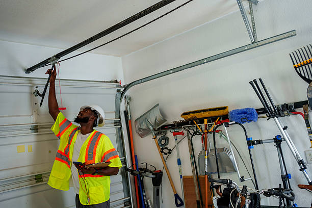 Professional Garage Door Panel Replacement technician working in Philmont, NY